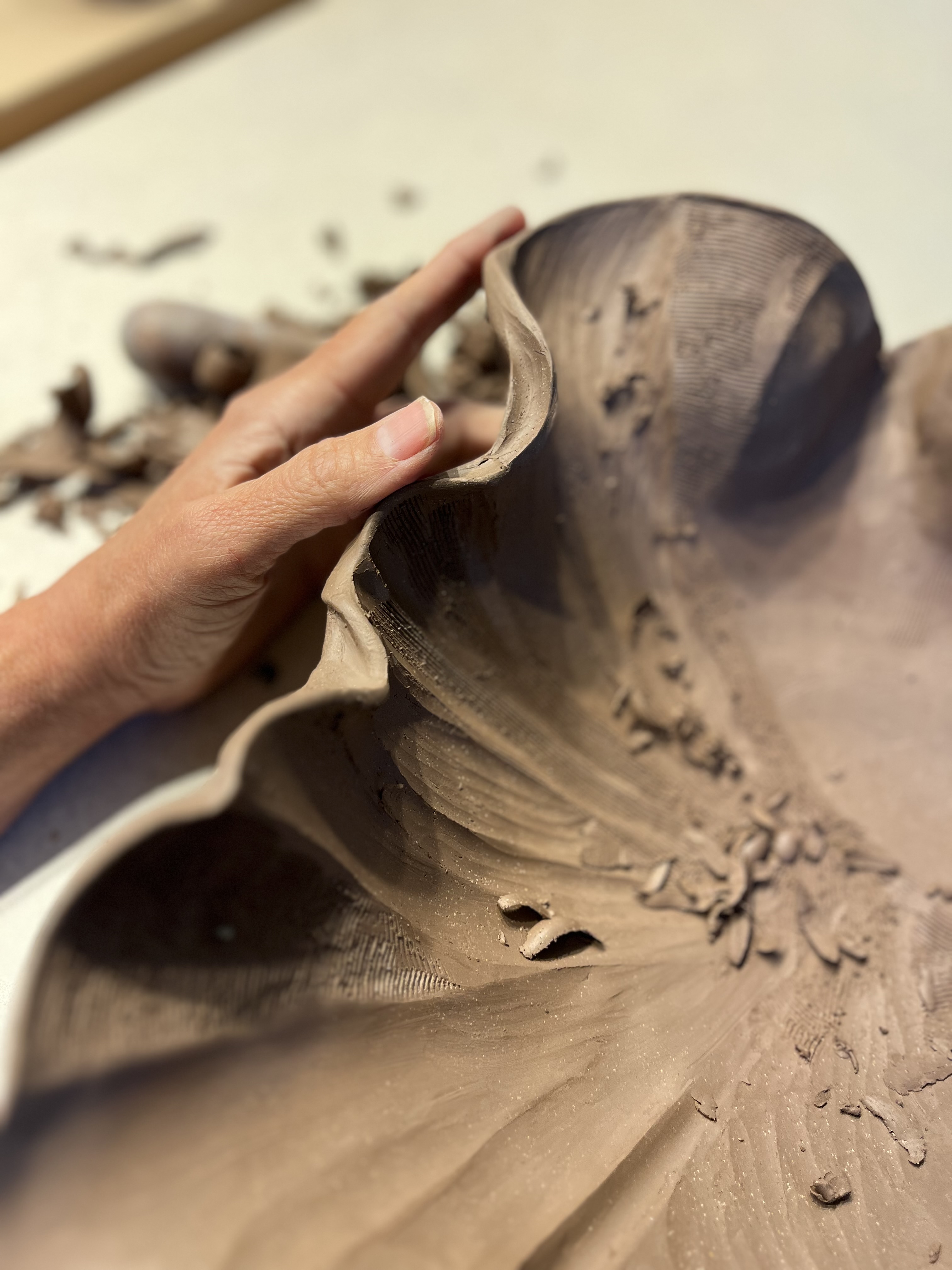 Sarah sculpting clay sink